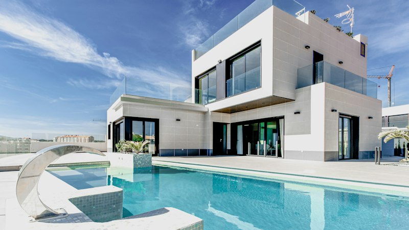 Two-story suburban home with a green lawn